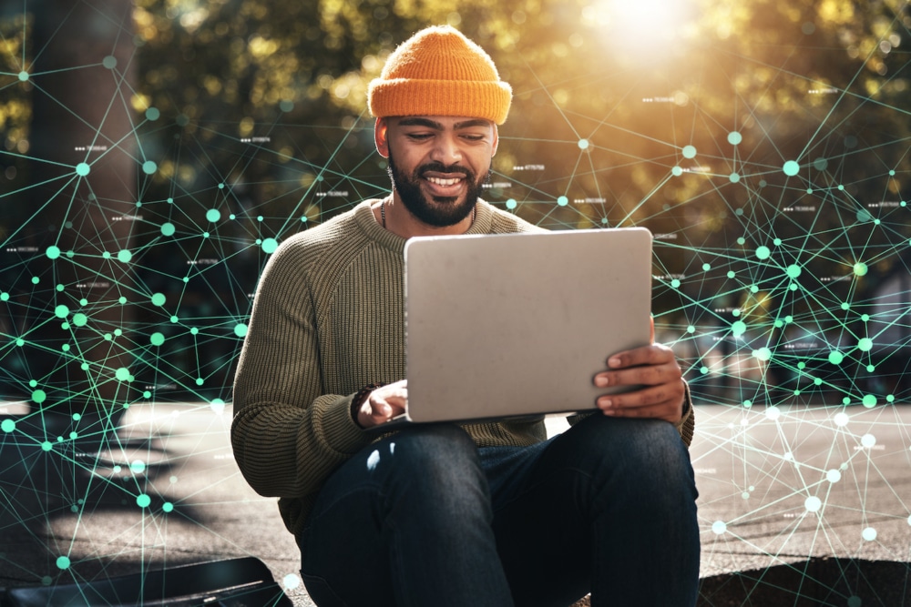 Man, student and laptop hologram of internet, information technology and software development research on campus. African person on computer, data integration and plexus network and university park Man, student and laptop hologram of internet